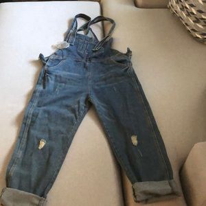 Distressed denim overalls
